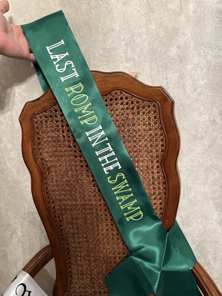 A custom sash lettered for a bachelorette party